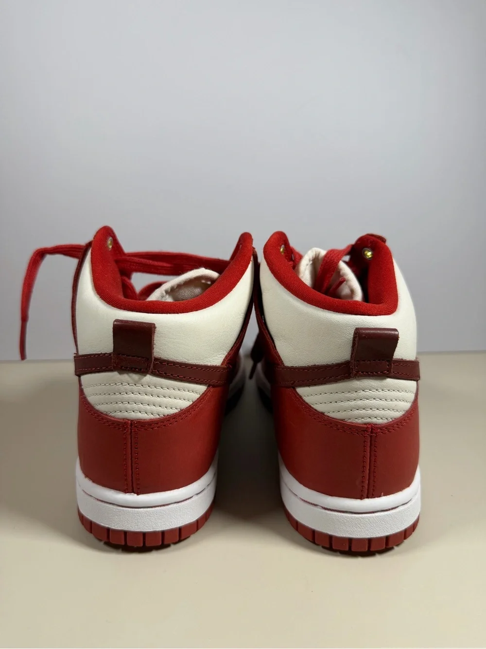 Nike Men’s Red and White High-Top Sneakers with Dark Red Swoosh